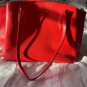 Large Kate spade tote bag the most beautiful red! Needs a new home.